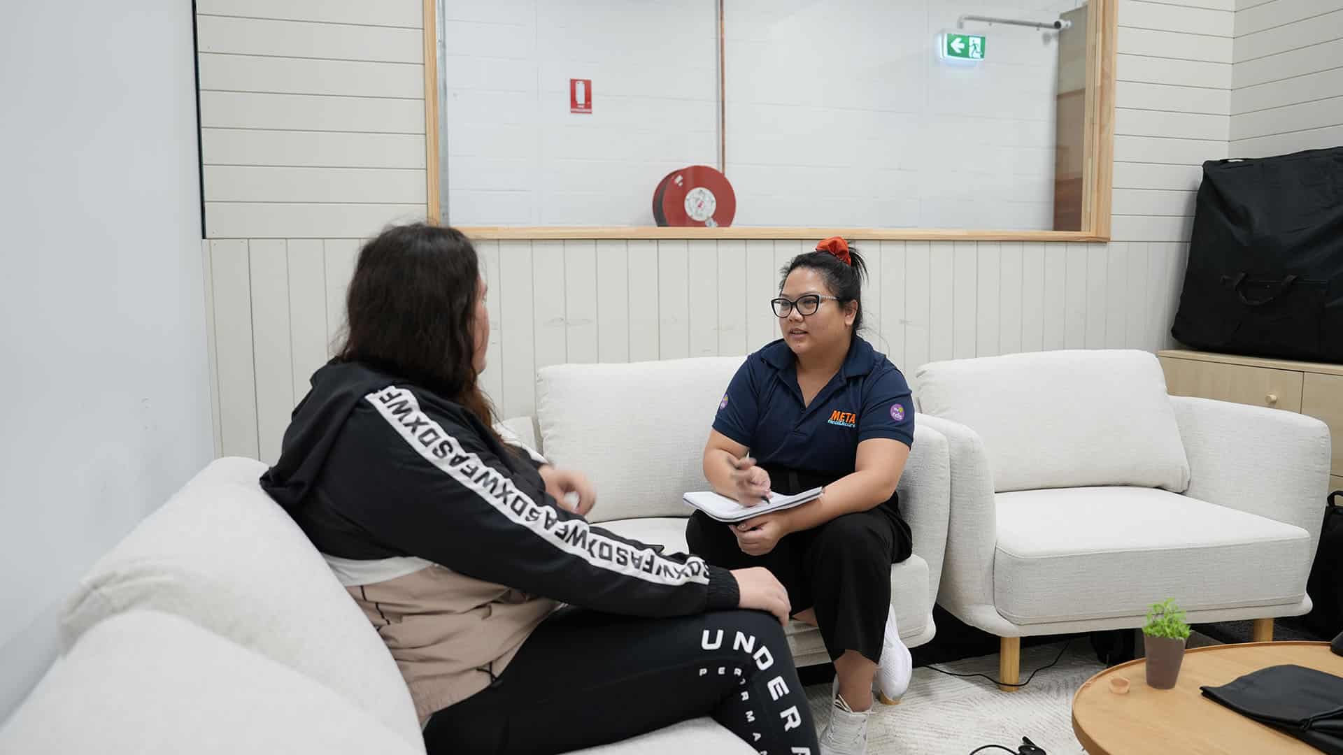 A Meta Healthcare support coordinator meeting with a participant