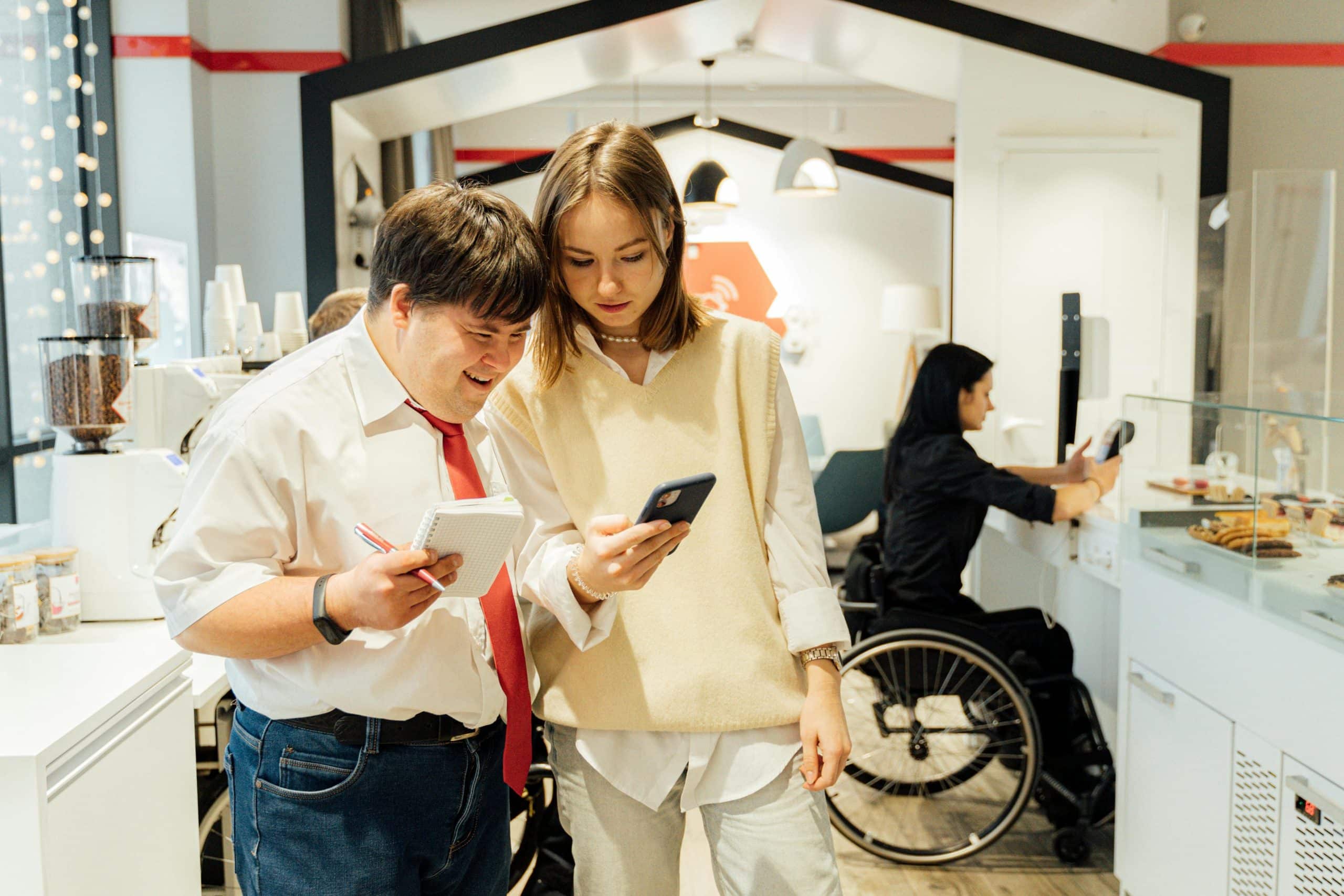 NDIS participant and support worker engaging in a supportive, inclusive workplace environment, reflecting the key qualities to look for in an NDIS provider.