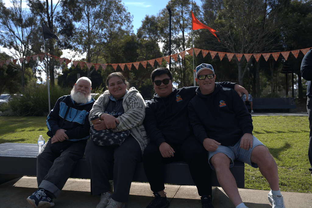 A group of friends enjoying a sunny day at the park.
