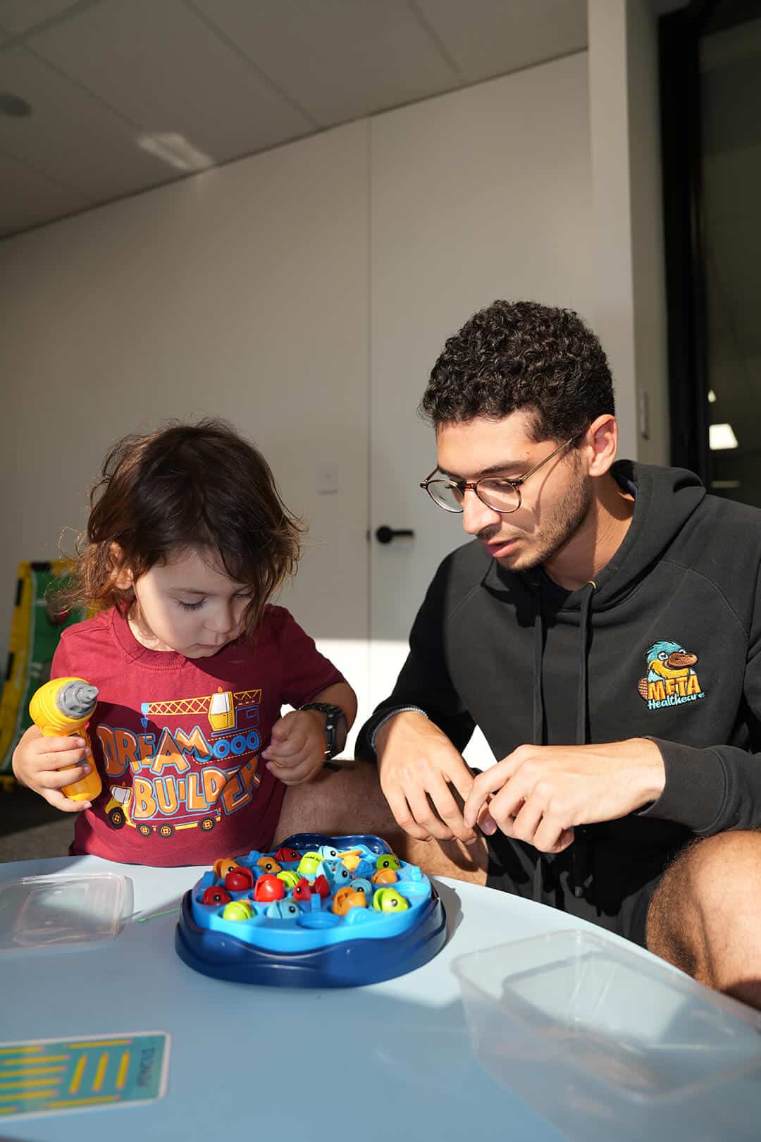 Engaging in an interactive learning activity with a fishing game.