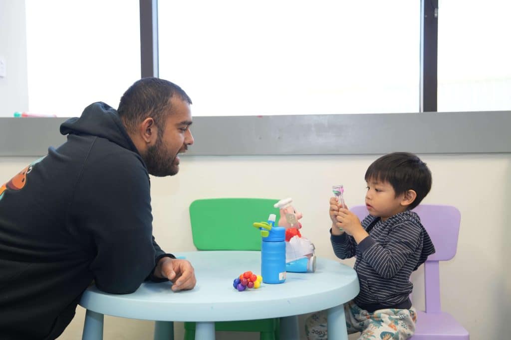 Meta Healthcare therapist engaging with a child during a play-based therapy session